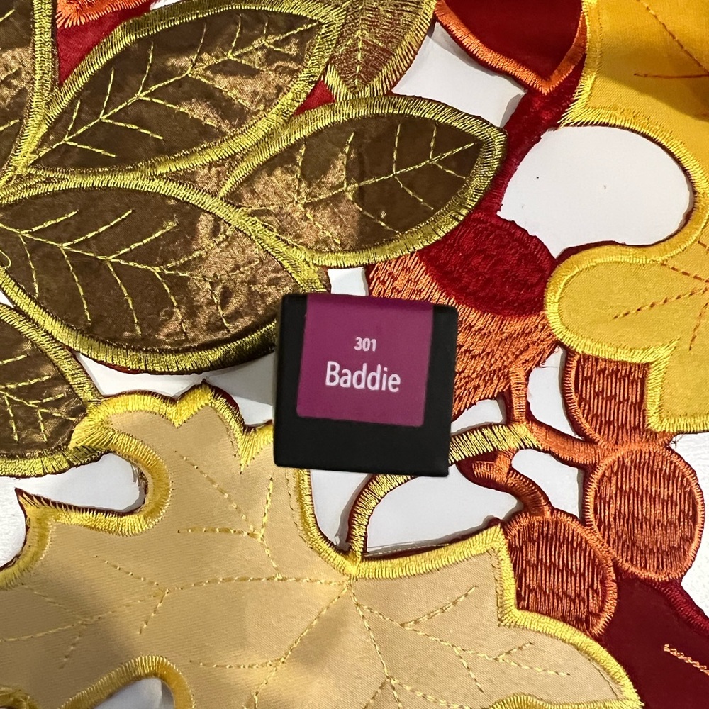 Color Street Baddie Lipstick - Berry-plum satin finish.
